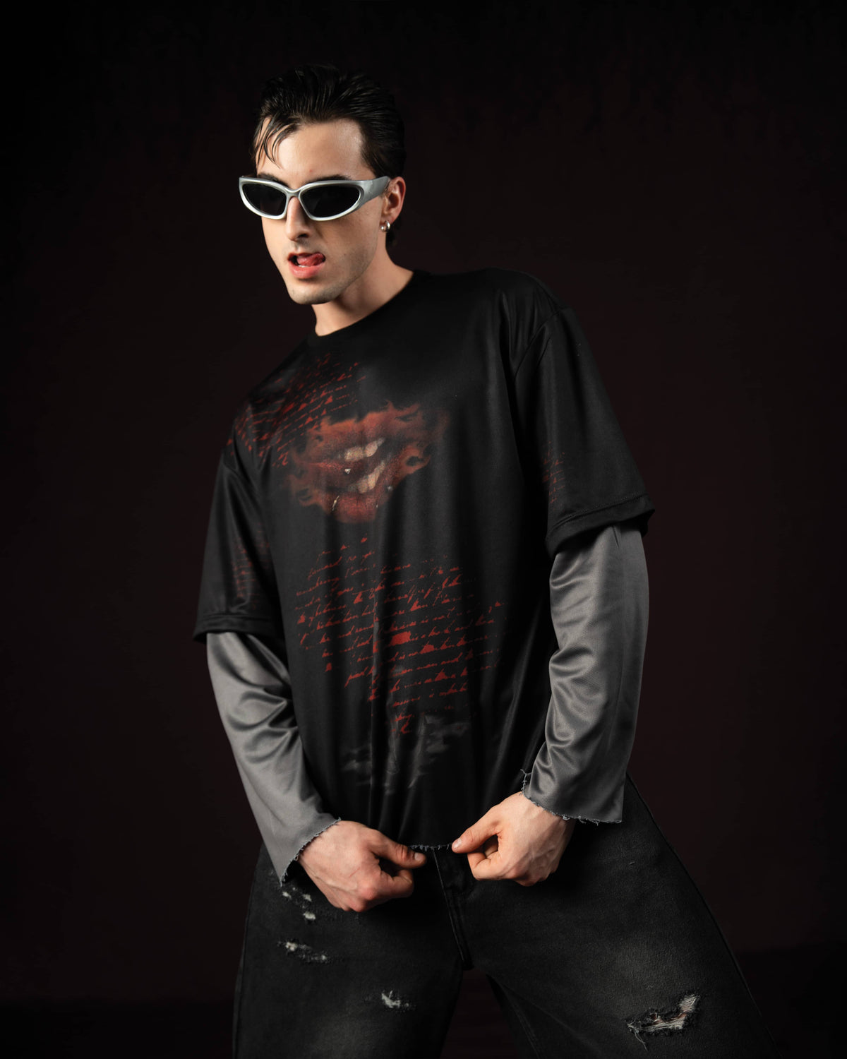 Zica Bella Bloodzic Jersey 01 black oversized streetwear jersey with red graphic worn by male model in styled fashion pose