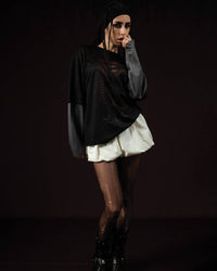 Zica Bella Bloodzic Jersey 01 black oversized streetwear jersey with red graphic worn by female model full outfit look