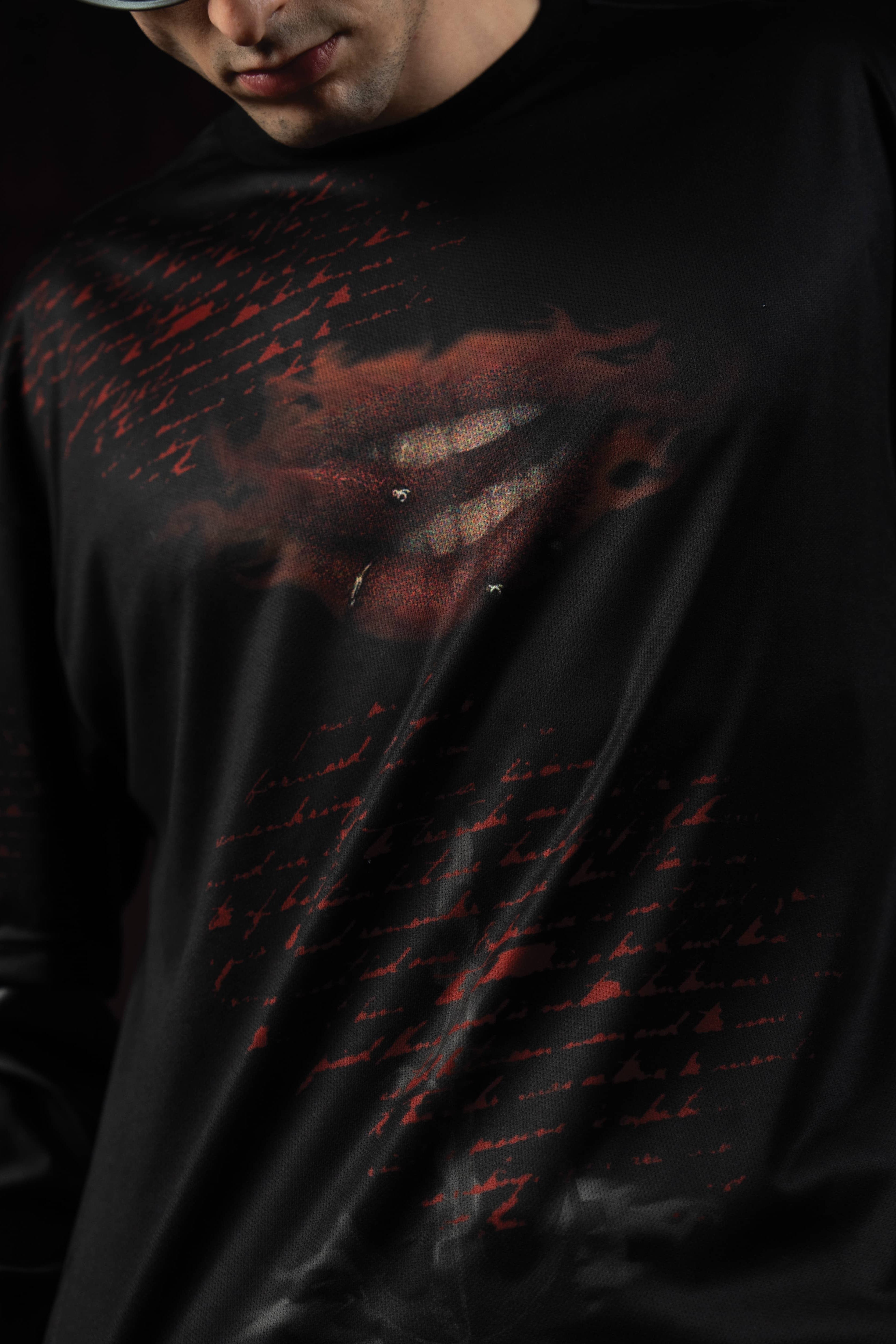 Zica Bella Bloodzic Jersey 01 black streetwear jersey with red glitch graphic design close up front detail