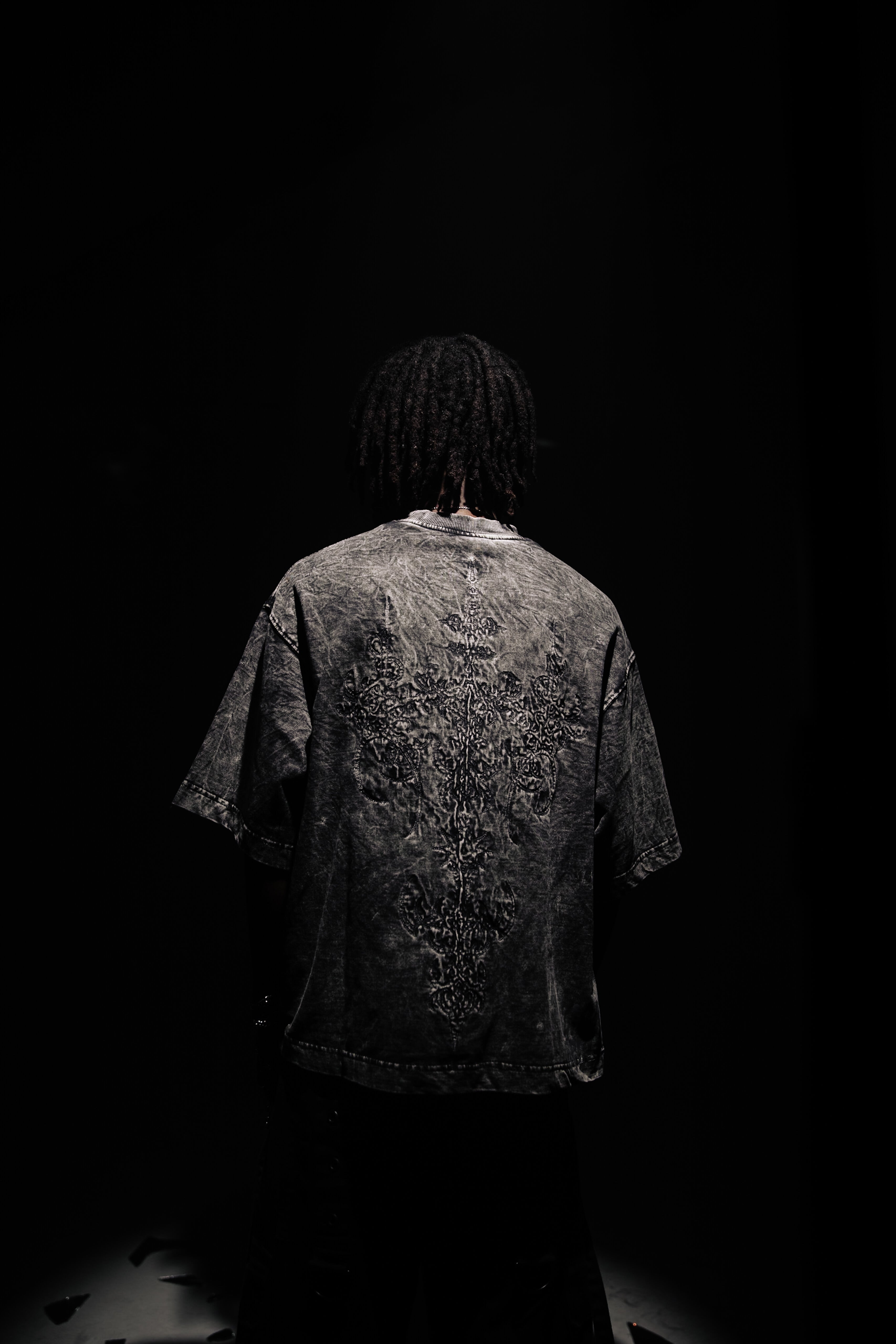 Embroidered Graphic Cotton T-Shirt in Black, showcasing intricate embroidery and oversized fit, perfect for streetwear fashion with unique design elements by zica bella