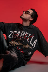 ZSTRIKE oversized acid wash streetwear t-shirt styled in a modern seated lookbook pose