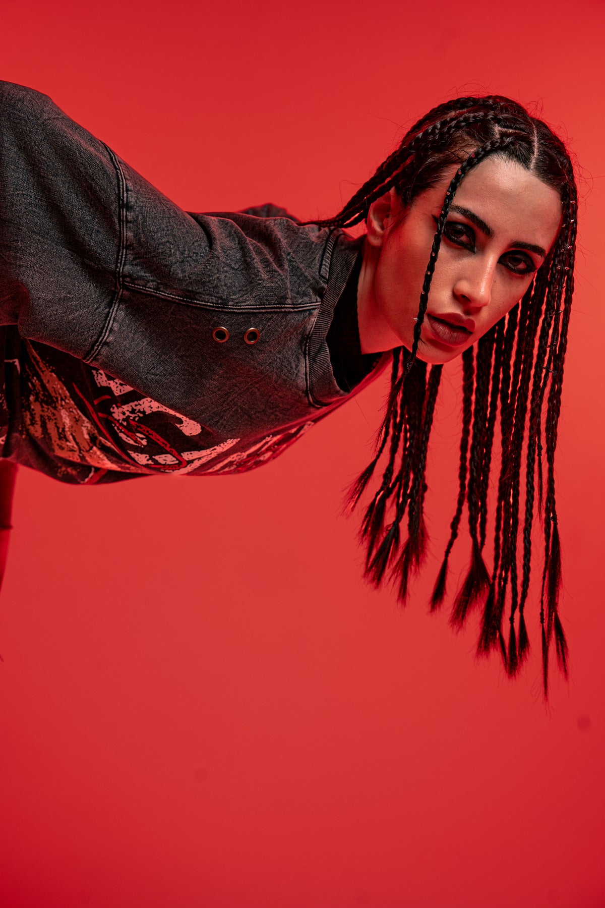 Close portrait shot of female model wearing premium acid wash oversized streetwear t shirt